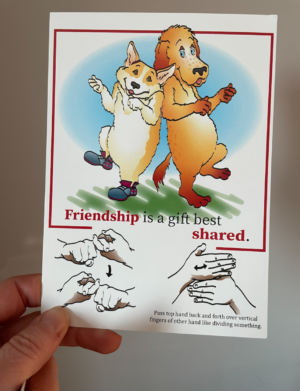 Duke and his friend Koa are dancing. There's a drawing of how to make the ASL sign for SHARE